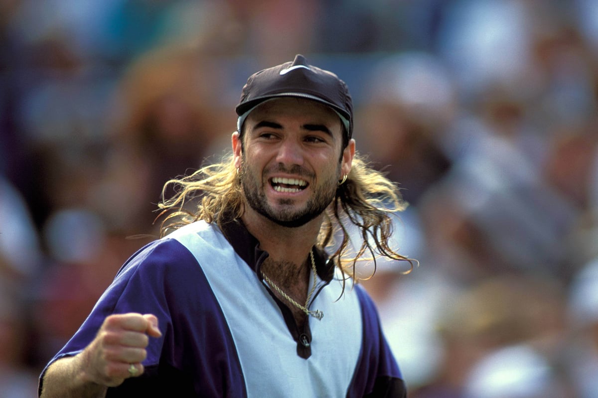 Andre Agassi celebrates