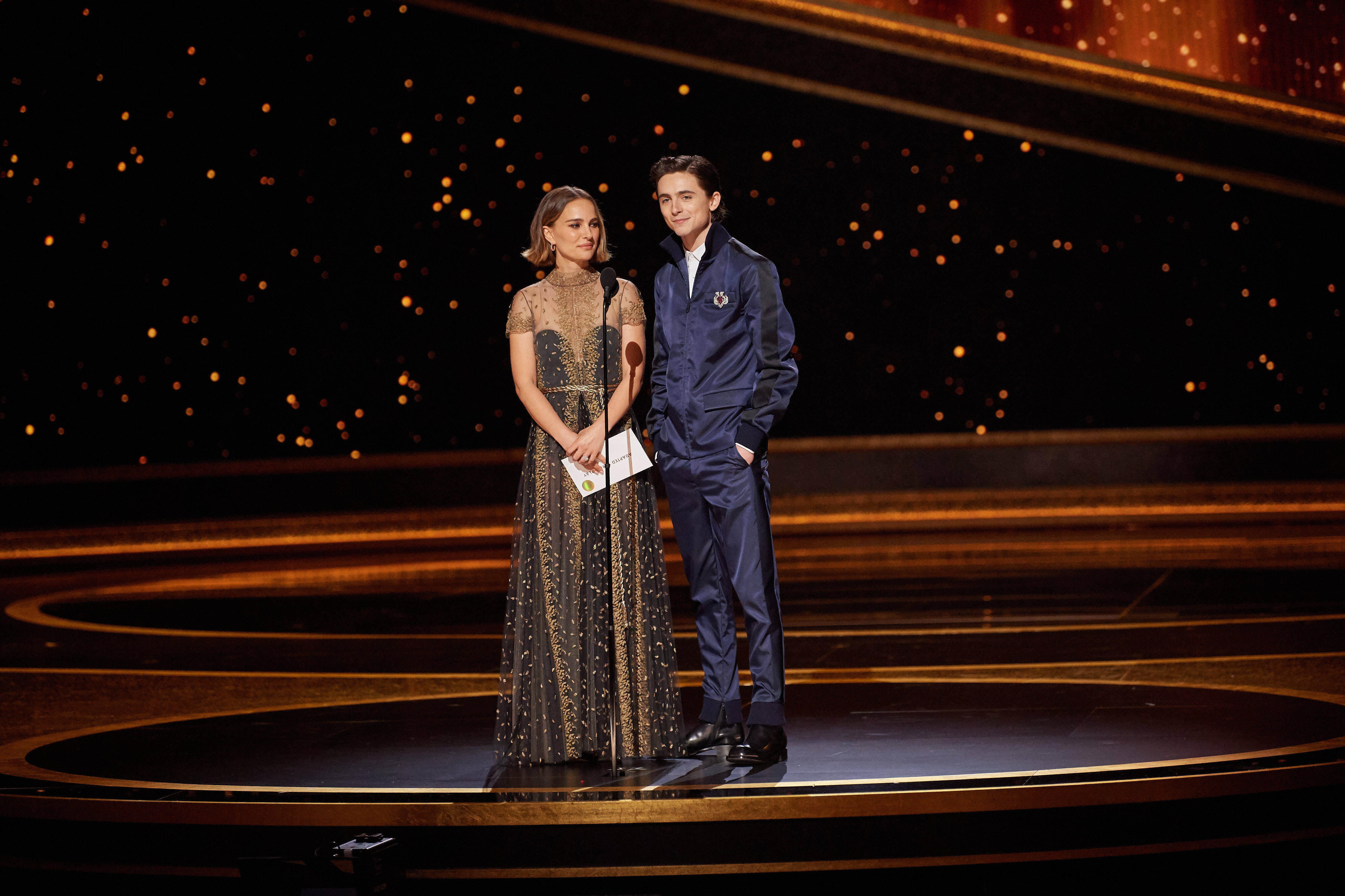 Natalie Portman and Timothee Chalamet present the Oscar for Adapted Screenplay during the live ABC Telecast of The 92nd Oscars at the Dolby Theatre in Hollywood. 