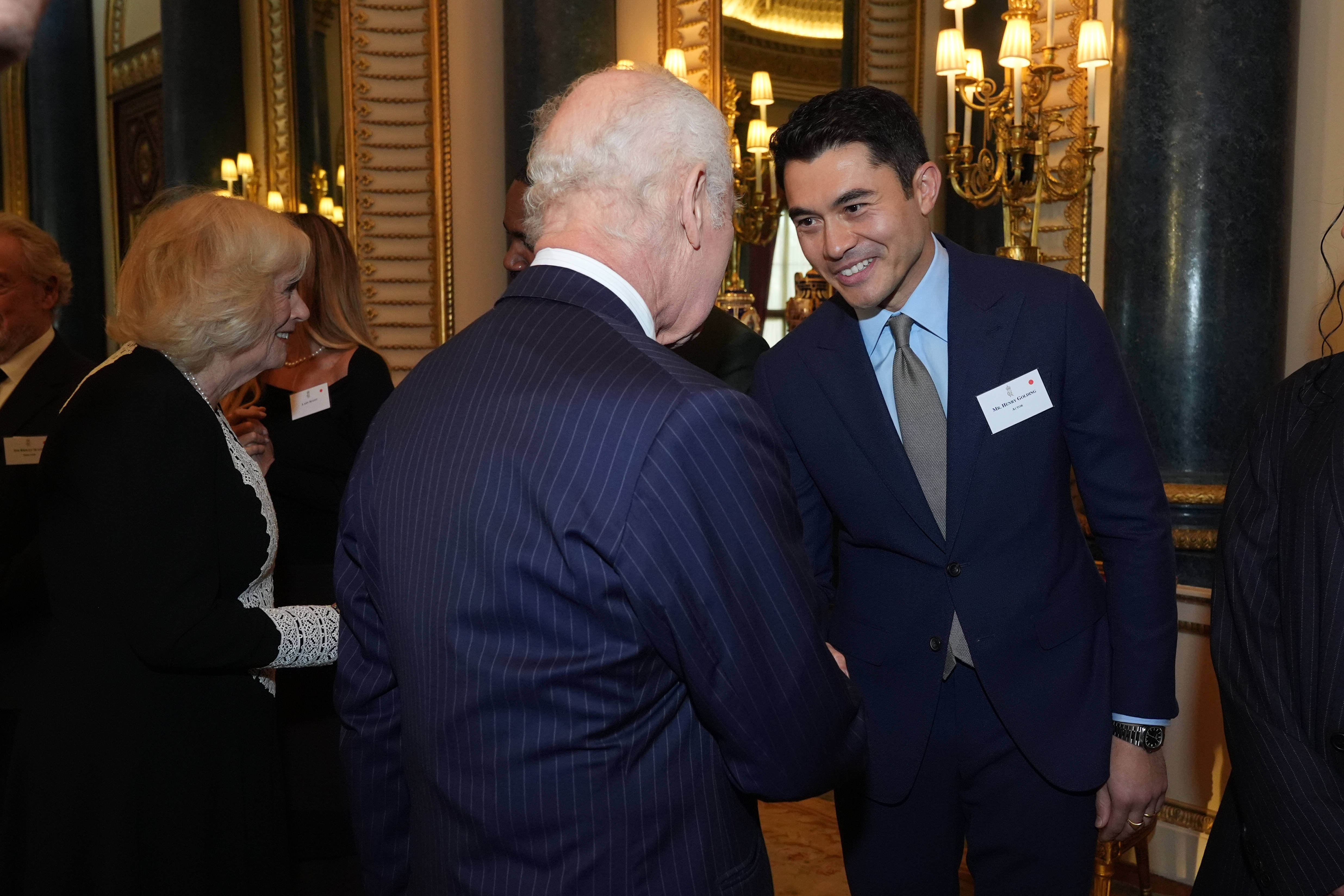 Centenary of the Film and TV charity King Charles III with Henry Golding during a reception to mark the centenary of the Film and TV charity.