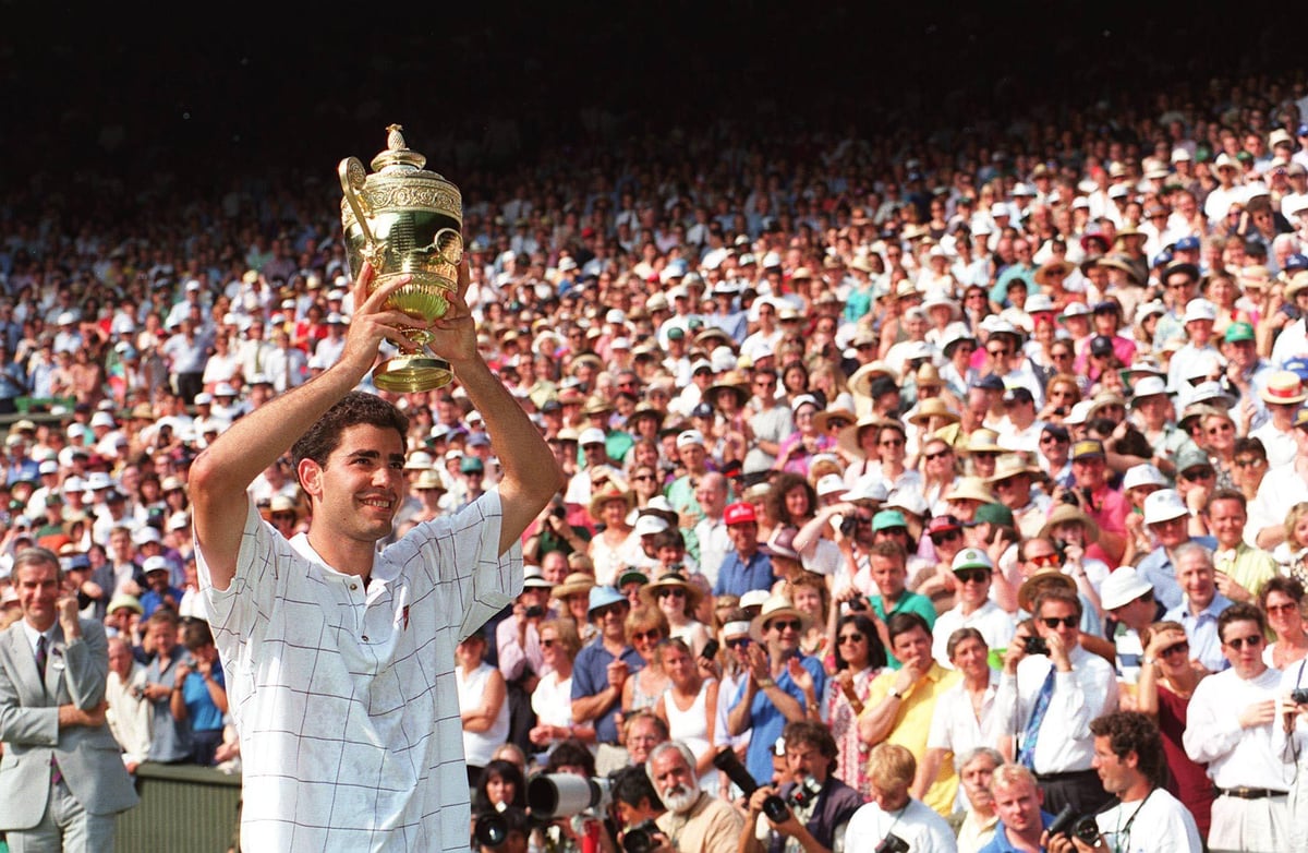 Pete Sampras trophy over his head celebrates