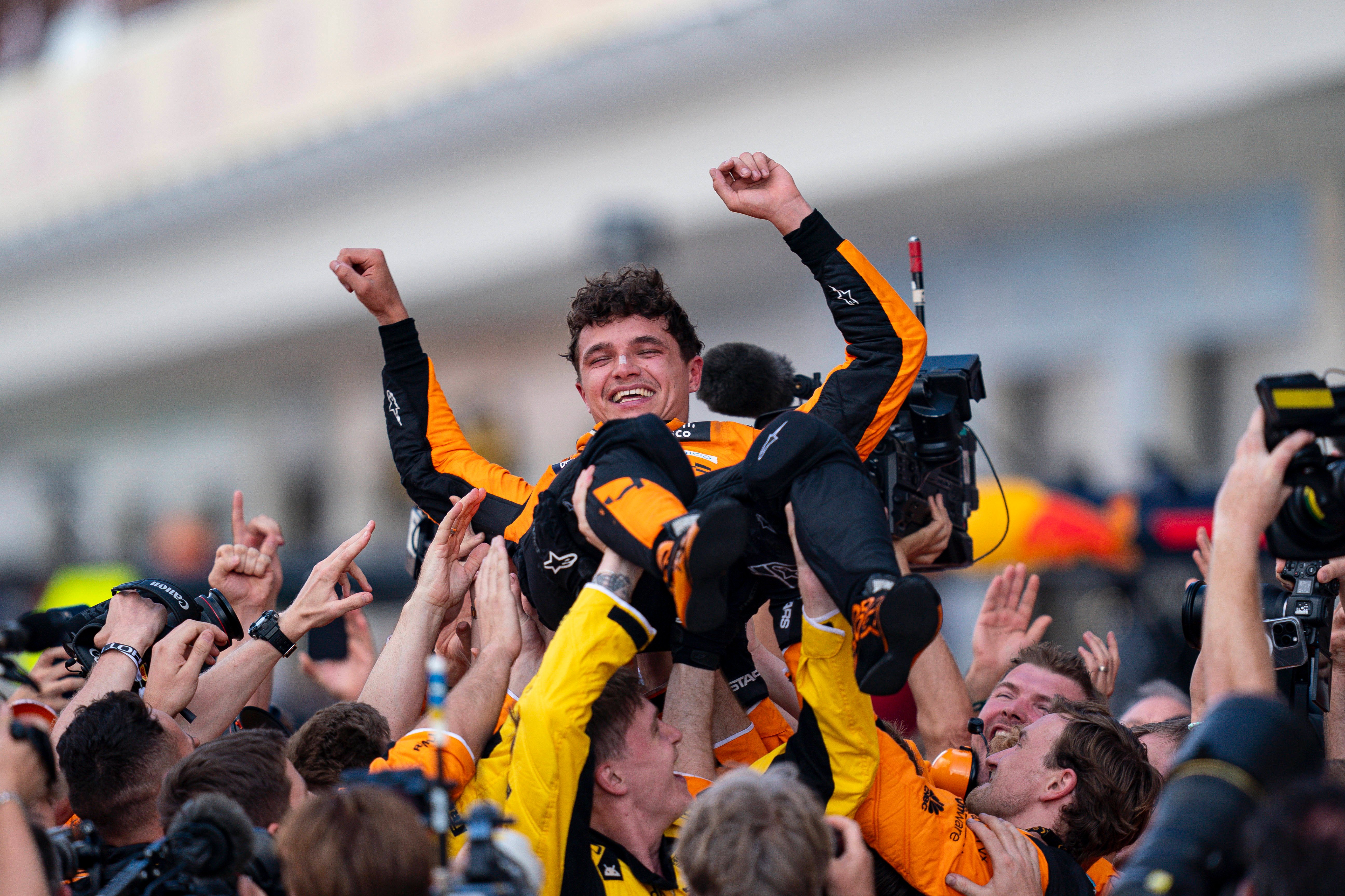 Lando Norris celebrates with his team after winning the Miami Grand Prix of the 2024 Formula 1 World Championship.