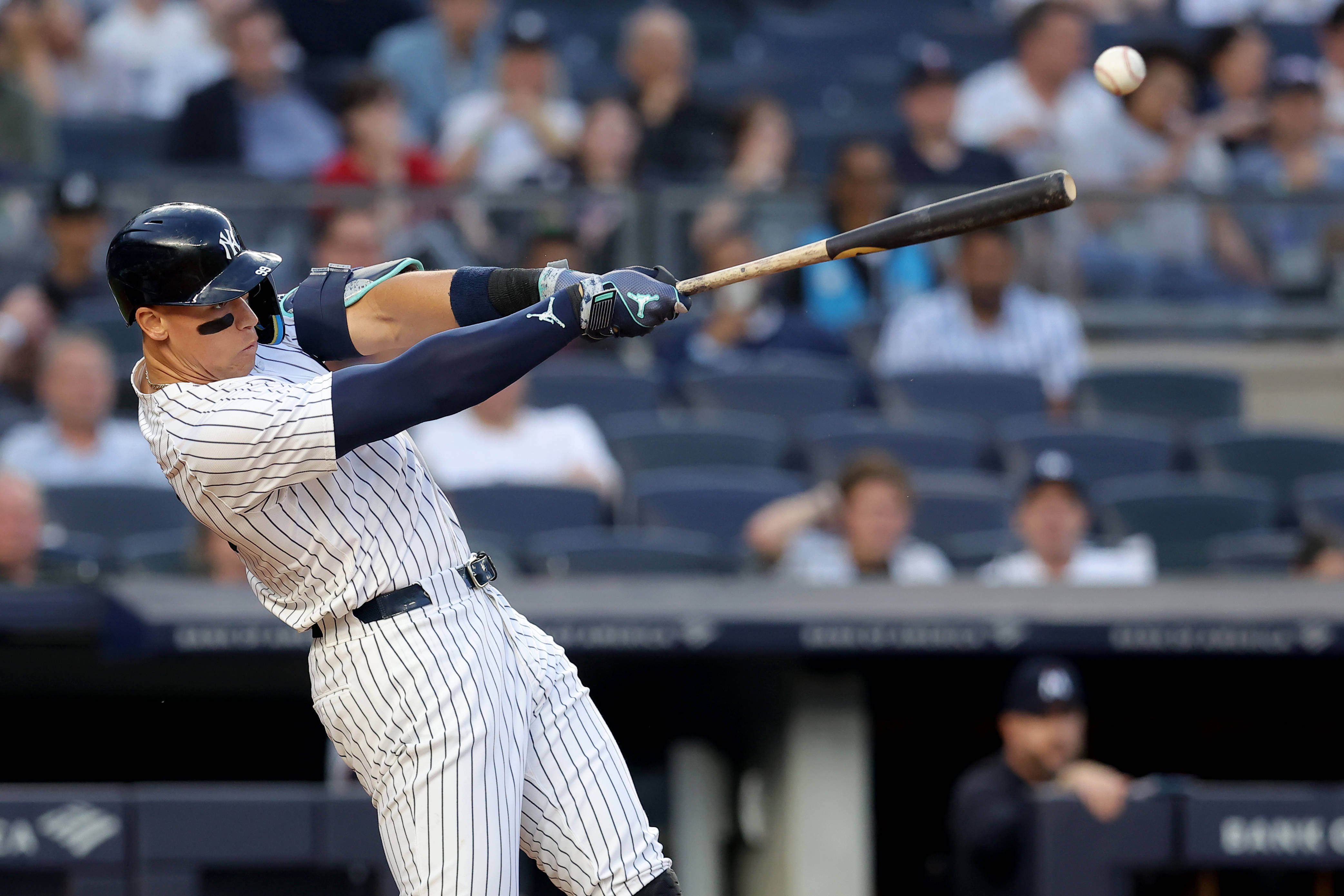 Yankees center fielder Aaron Judge (99) hits a two run double against the Minnesota Twins during the third inning at Yankee Stadium.