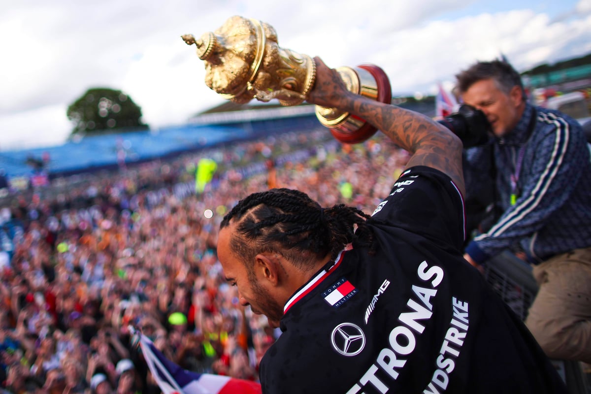 Lewis Hamilton celebrates win trophy 2024 British GP F1