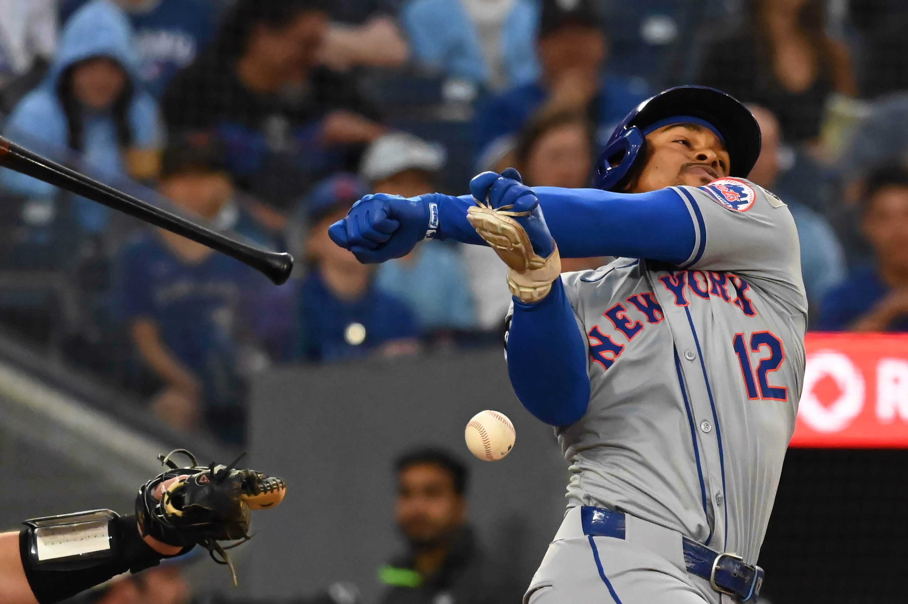 Francisco Lindor (12) loses the grip on his bat against the Toronto Blue Jays.