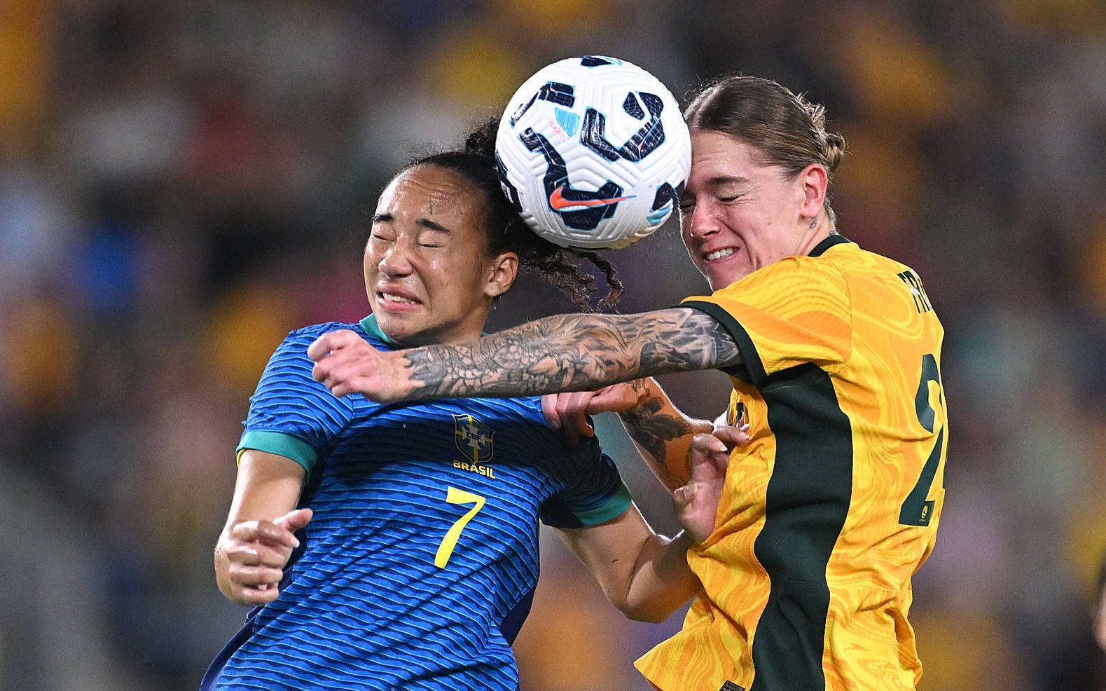 Photo of Aline Gomes Amaro of Brazil (left) competes with Sham Freier of the Matildas